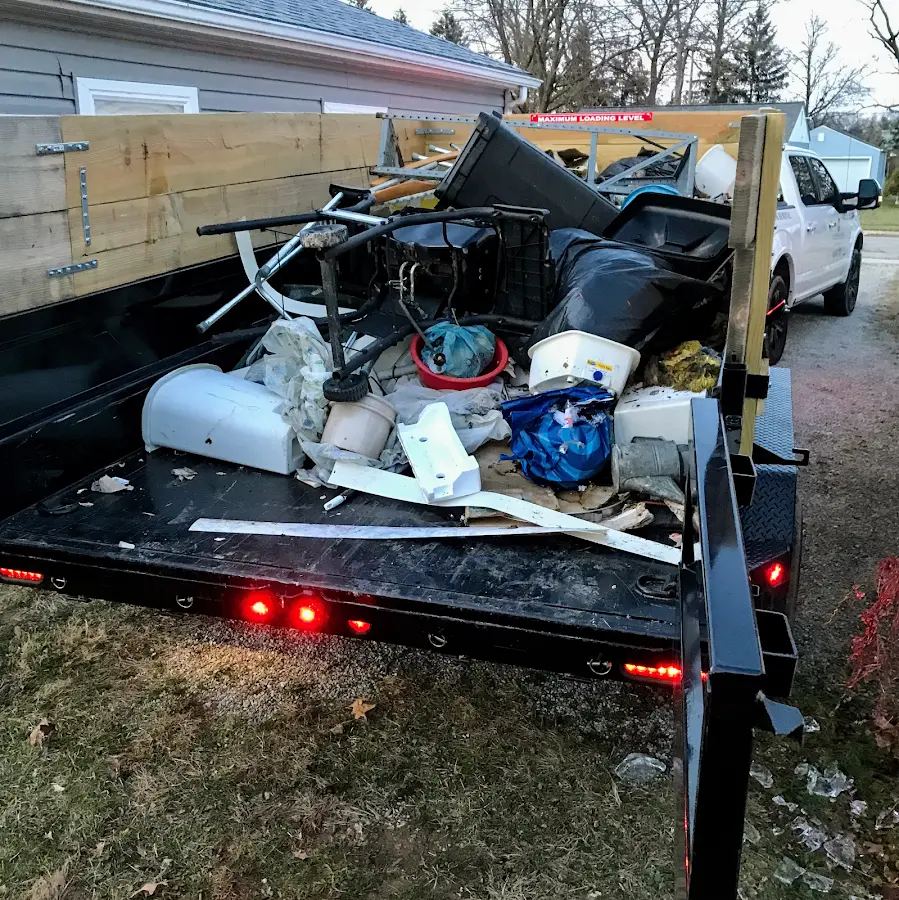 Roll-off dumpster delivered to a residential driveway in Rio Rancho