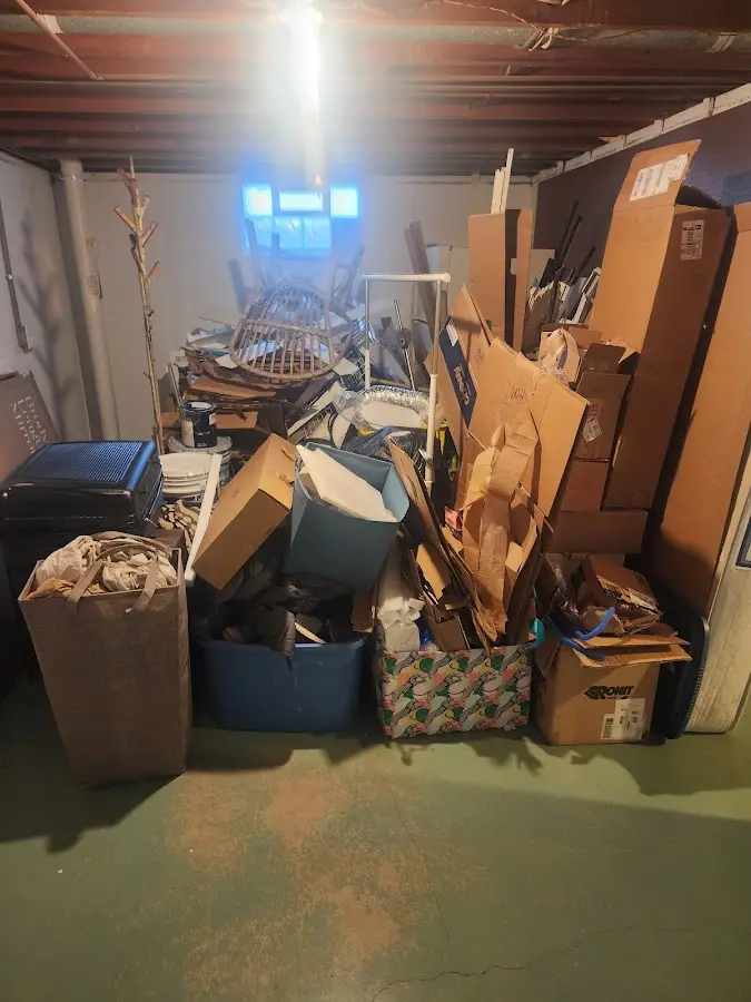 Roll-off dumpster container at job site for 20 Yard Dumpster Rental in Rio Rancho